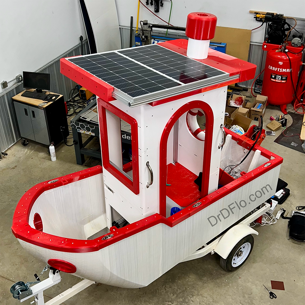 Installing roof and red trim on the life-size benchy