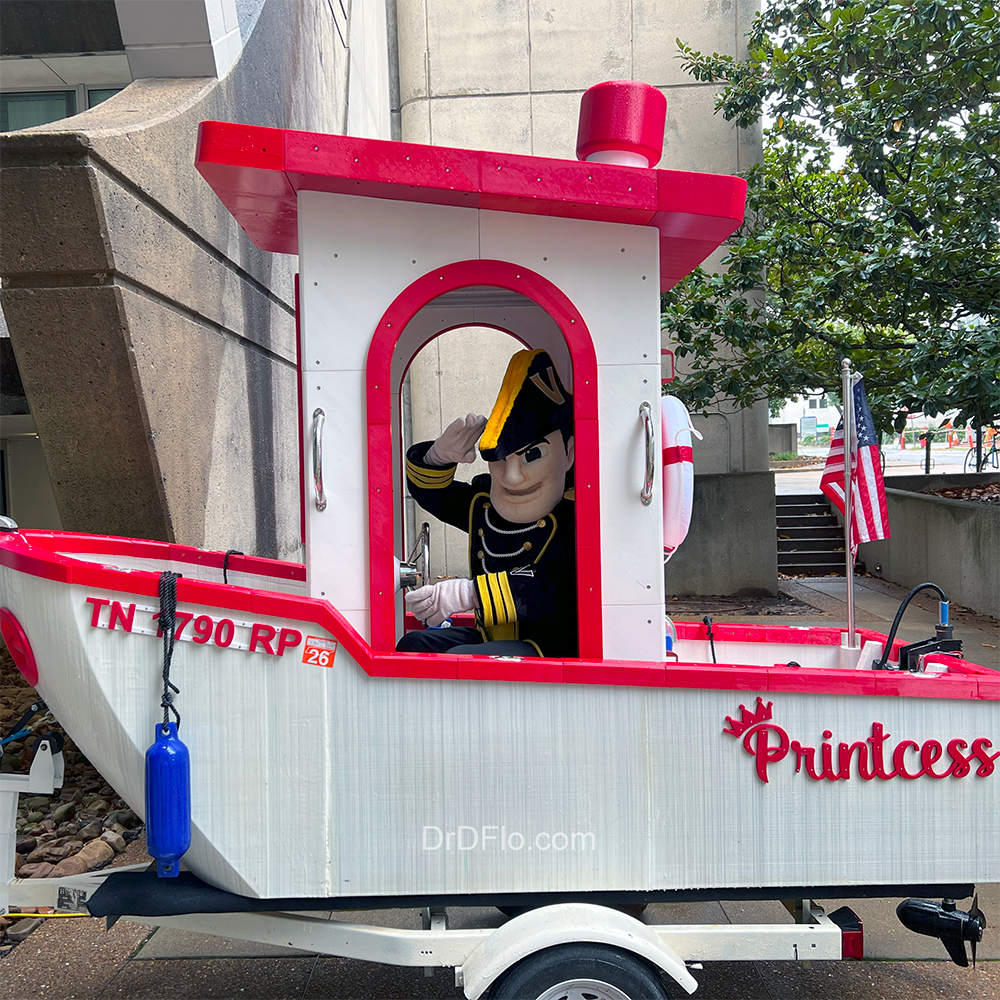 Mr. Commodore, aka Mr. C, the mascot for Vanderbilt University, inside of Dr. D-Flo's 3D Printed Boat at the TNMakerFest